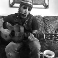 A loved one playing guitar