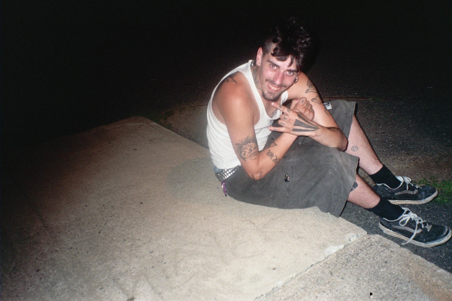 A loved one sitting outside at night