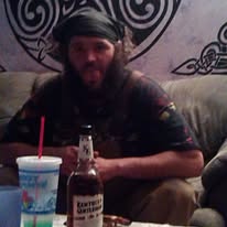 A loved one seated indoors at a table
