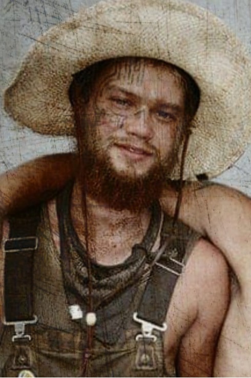 A loved one wearing a straw hat and overalls